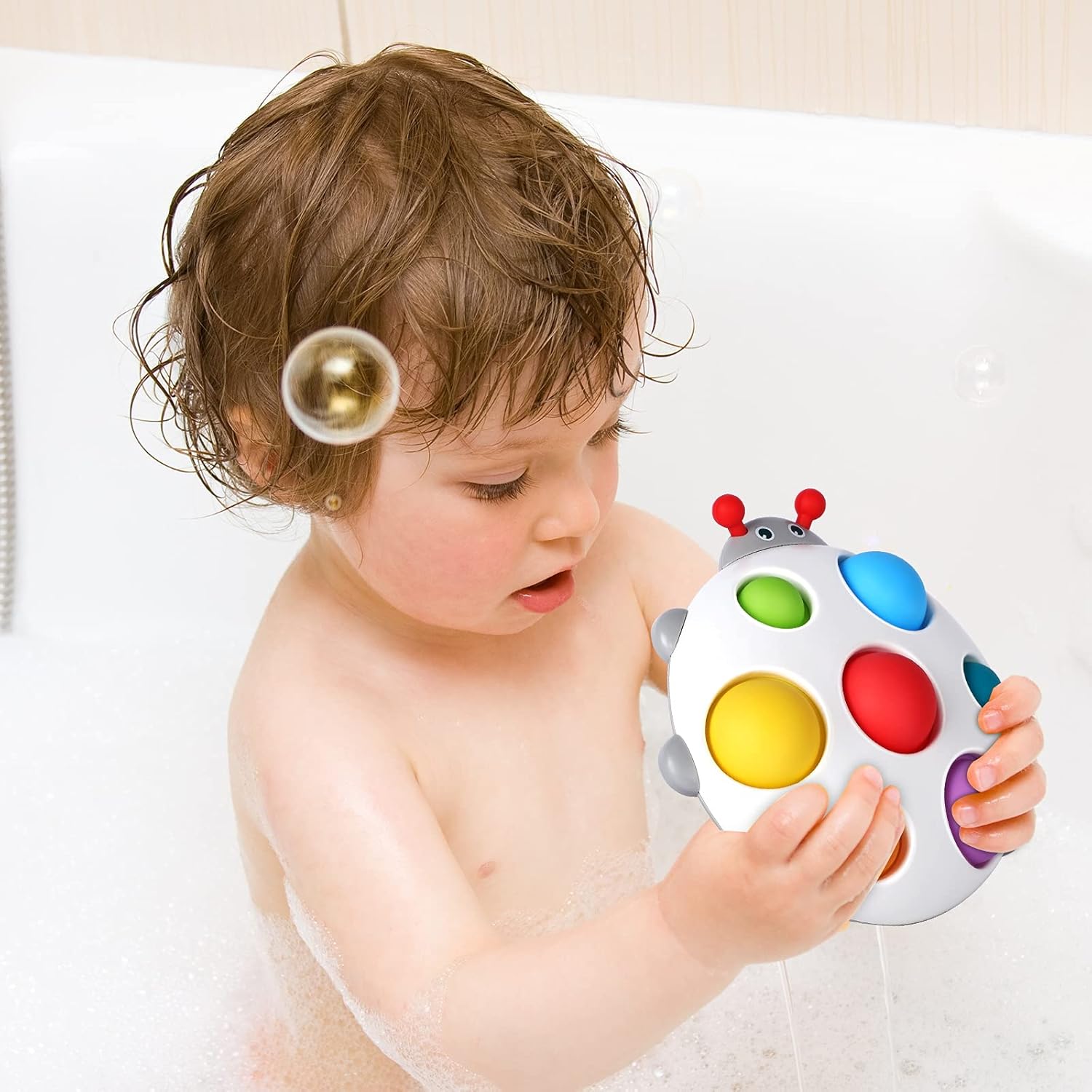 Fidtoy Baby Sensory Pop Toy Juguete sensorial de silicona para bebés con hoyuelos para niños pequeños de 6 meses o más, tabla de burbujas táctil, juguete de baño de viaje tranquilo, juguete de habilidades motoras finas