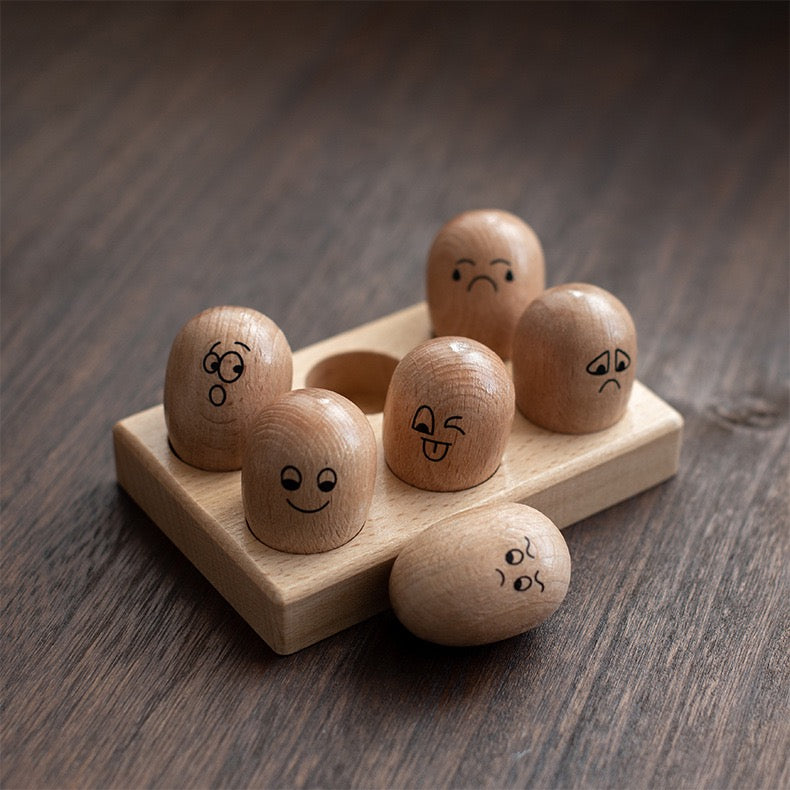 Huevo de madera con emoticonos - Juguetes de exploración