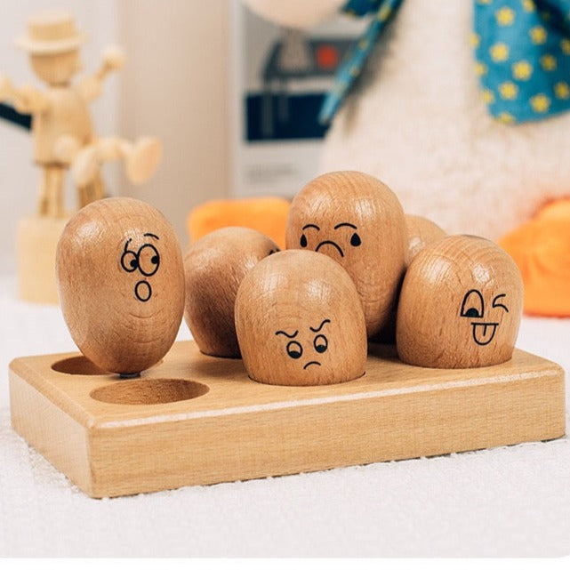 Huevo de madera con emoticonos - Juguetes de exploración