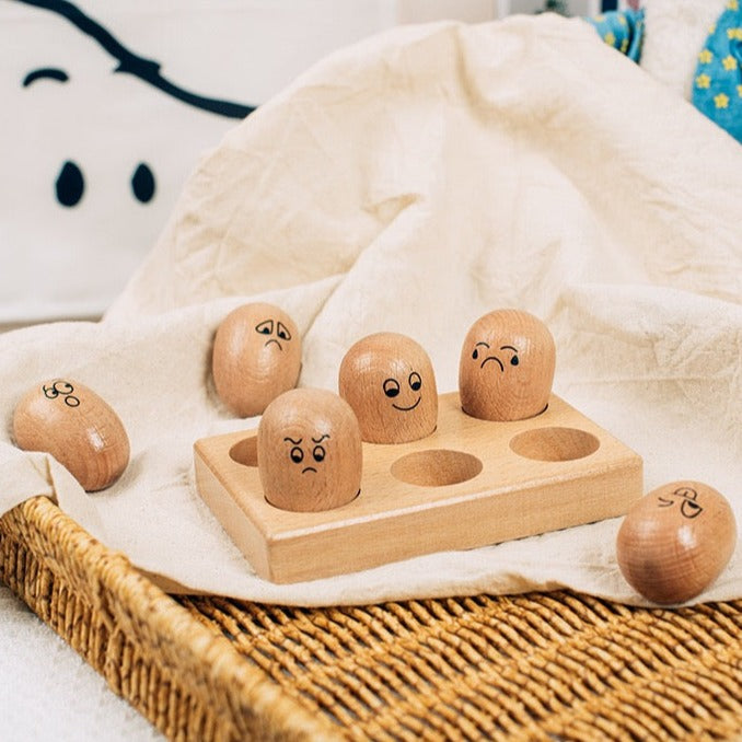 Huevo de madera con emoticonos - Juguetes de exploración
