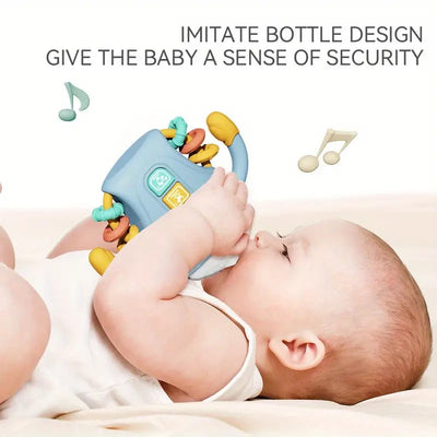 Fidtoy Biberon sensoriel bébé réconfortant avec lumières, musique et anneau de dentition | Jouet d'apprentissage apaisant pour bébés de 6 à 24 mois