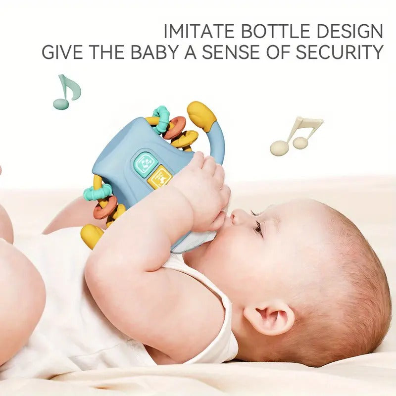 Fidtoy Biberon sensoriel bébé réconfortant avec lumières, musique et anneau de dentition | Jouet d'apprentissage apaisant pour bébés de 6 à 24 mois