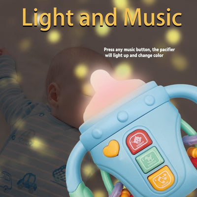Fidtoy Biberon sensoriel bébé réconfortant avec lumières, musique et anneau de dentition | Jouet d'apprentissage apaisant pour bébés de 6 à 24 mois