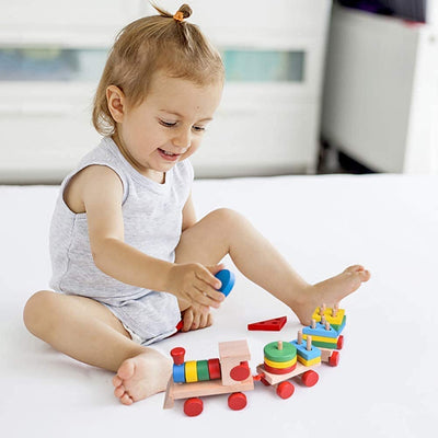 Tren de juguete apilable de madera Fidtoy para que los niños pequeños aprendan jugando