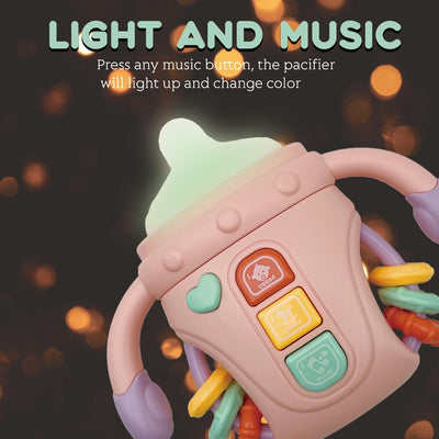 Fidtoy Biberon sensoriel bébé réconfortant avec lumières, musique et anneau de dentition | Jouet d'apprentissage apaisant pour bébés de 6 à 24 mois