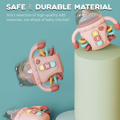 Fidtoy Biberon sensoriel bébé réconfortant avec lumières, musique et anneau de dentition | Jouet d'apprentissage apaisant pour bébés de 6 à 24 mois