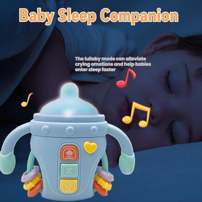 Fidtoy Biberon sensoriel bébé réconfortant avec lumières, musique et anneau de dentition | Jouet d'apprentissage apaisant pour bébés de 6 à 24 mois