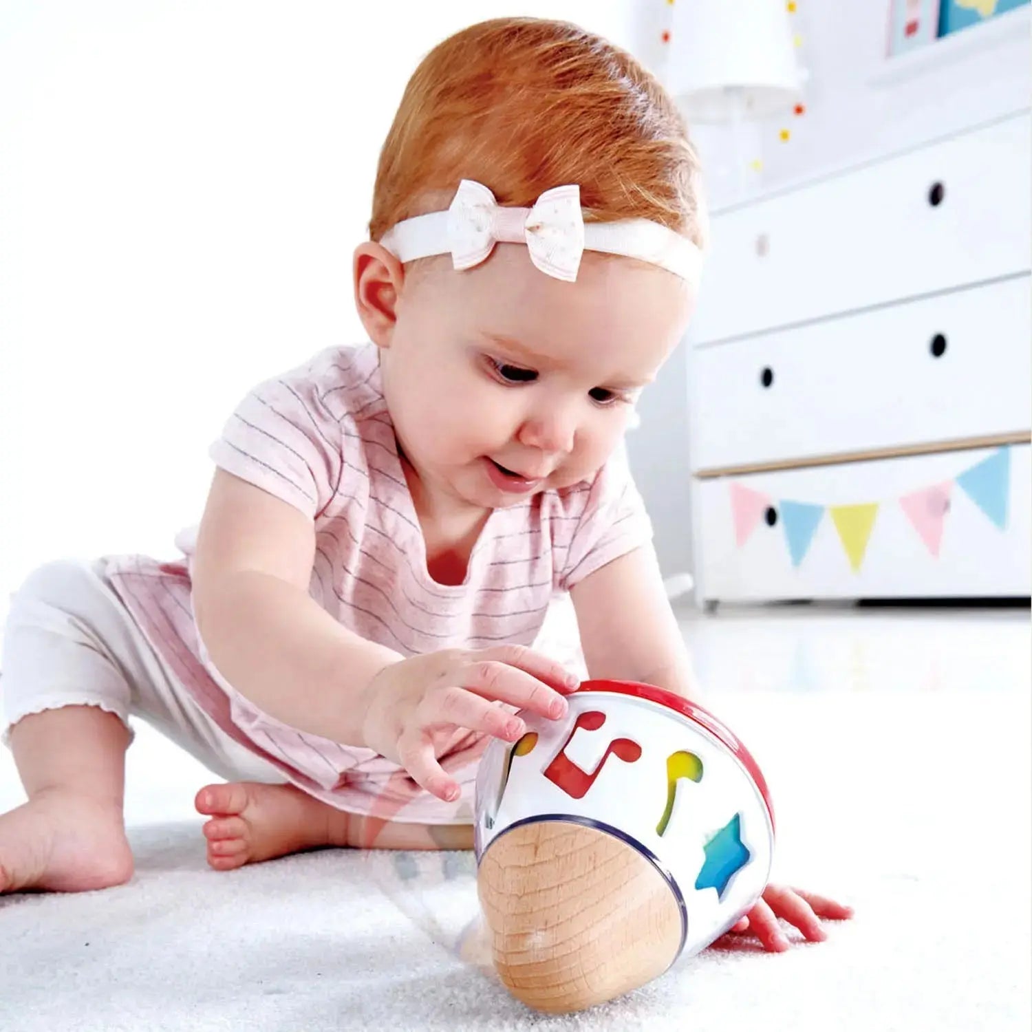 Jouet musical rotatif en bois Fidtoy pour bébés dès la naissance