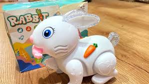 Lapin musical Fidtoy avec lumières, sons et fonction de saut