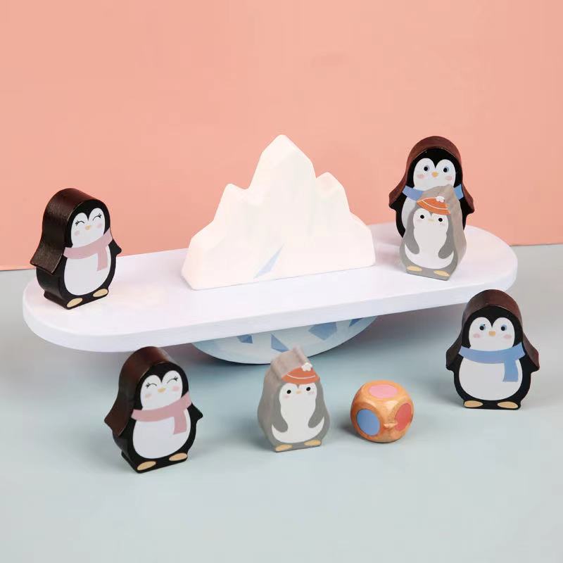 Jeu d'équilibre avec des pingouins en bois - Jouets pour la motricité fine